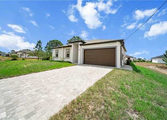 Property at 740 Newhall St E, Lehigh Acres, FL 33974, 3 beds, 2 baths