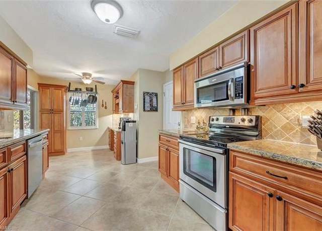 Property at 715 96th Ave N, Naples, FL 34108, 3 beds, 2 baths