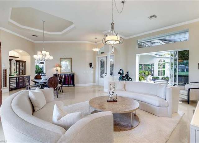 Property at 914 Spanish Moss Trl, Naples, FL 34108, 4 beds, 3 baths