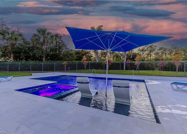 Property at 1801 Senegal Date Dr, Naples, FL 34119, 4 beds, 3.5 baths