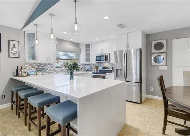 Property at 9798 Oxford St, Naples, FL 34109, 3 beds, 2 baths