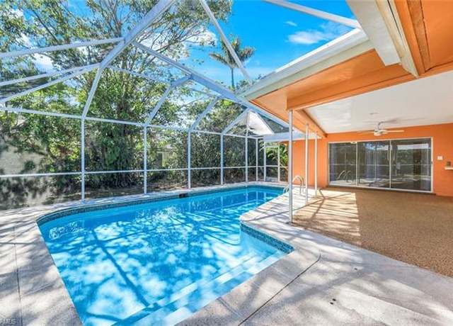 Property at 268 Baltusrol Dr, Naples, FL 34113, 3 beds, 2 baths