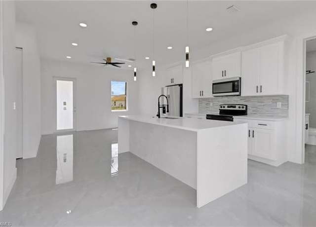 Property at 3310 14th St W, Lehigh Acres, FL 33971, 3 beds, 3 baths