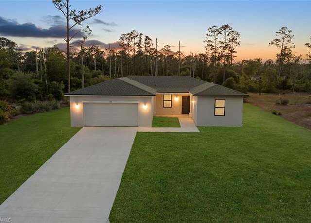 Property at 909 Wells Ave, Lehigh Acres, FL 33972, 4 beds, 3 baths