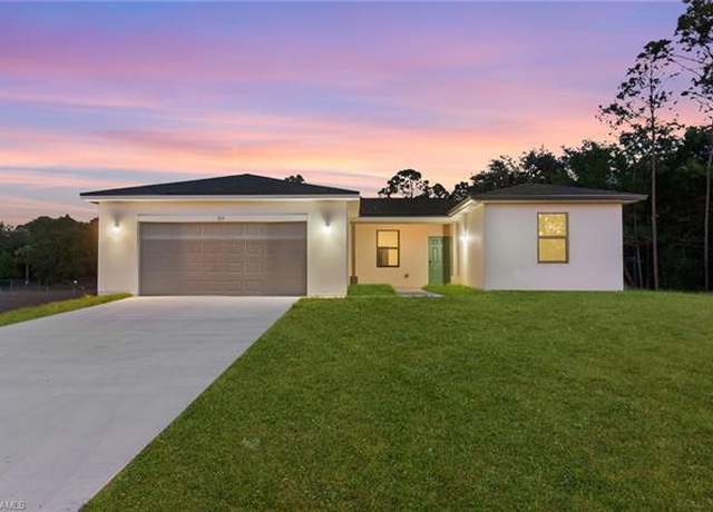 Property at 713 Wells Ave, Lehigh Acres, FL 33972, 4 beds, 3 baths