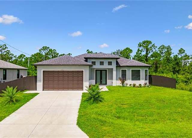 Property at 570 Sherwood Ave S, Lehigh Acres, FL 33974, 4 beds, 2 baths