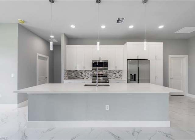 Property at 4002 22nd St SW, Lehigh Acres, FL 33976, 3 beds, 2 baths