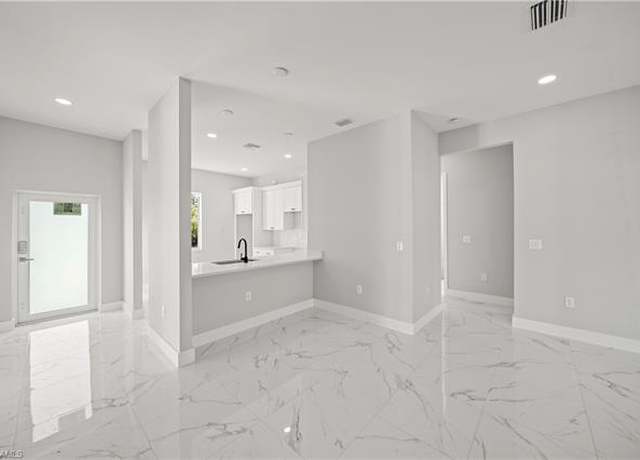 Property at 836 Clow St E, Lehigh Acres, FL 33974, 3 beds, 2 baths