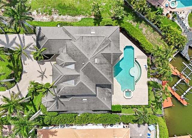 Property at 384 Mooring Line Dr, Naples, FL 34102, 5 beds, 5.5 baths