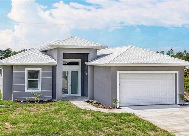 Property at 650 Kraft St, Lehigh Acres, FL 33974, 4 beds, 3.5 baths