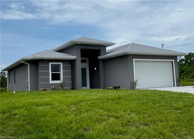 Property at 650 Kraft St, Lehigh Acres, FL 33974, 4 beds, 3.5 baths