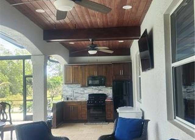 Property at 1385 47th Ave NE, Naples, FL 34120, 4 beds, 4 baths