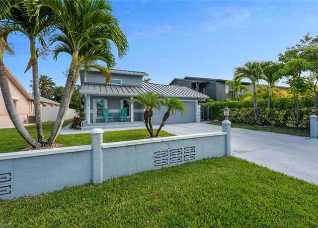 Property at 607 92nd Ave N, Naples, FL 34108, 4 beds, 3 baths