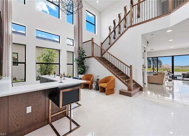 Property at 21035 Teak Tree Ter, Estero, FL 33928, 5 beds, 7 baths