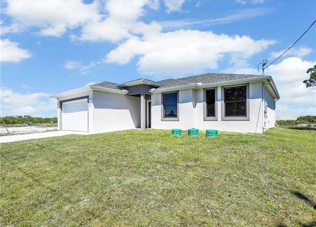 Property at 633 Cane St E, Lehigh Acres, FL 33974, 3 beds, 2 baths