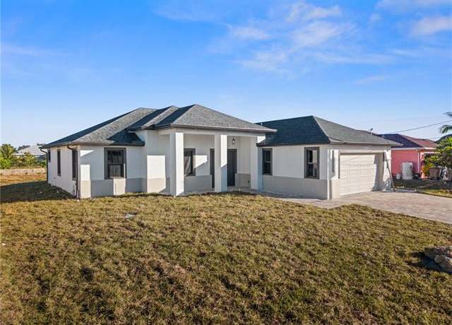 Property at 5002 Beauty St, Lehigh Acres, FL 33971, 3 beds, 3.5 baths
