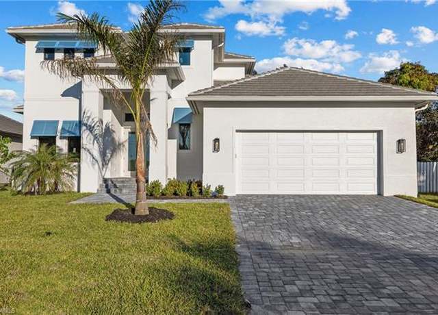 Property at 1448 10th St N, Naples, FL 34102, 4 beds, 3.5 baths