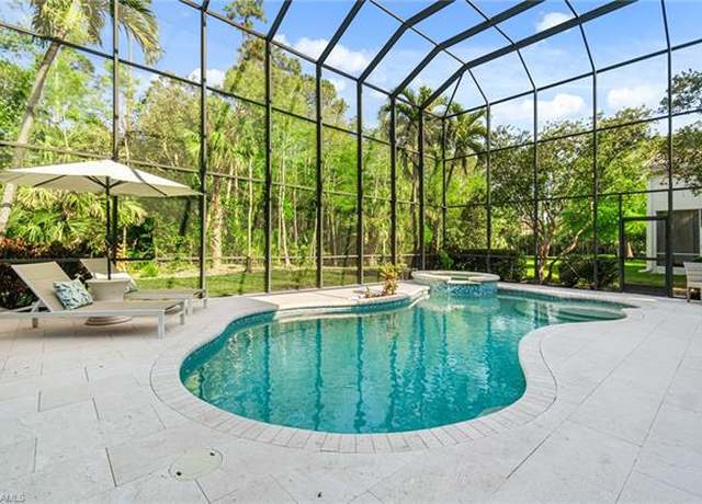Property at 2338 Butterfly Palm Dr, Naples, FL 34119, 4 beds, 3 baths