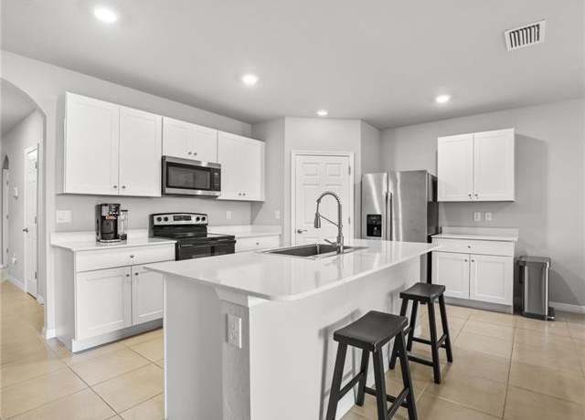Property at 26480 Chaparel Dr, Bonita Springs, FL 34135, 4 beds, 2 baths