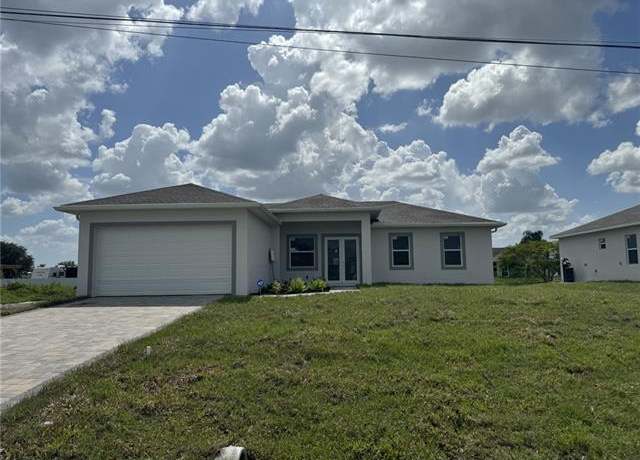 Property at 4604 Flora Ave S, Lehigh Acres, FL 33976, 4 beds, 2 baths