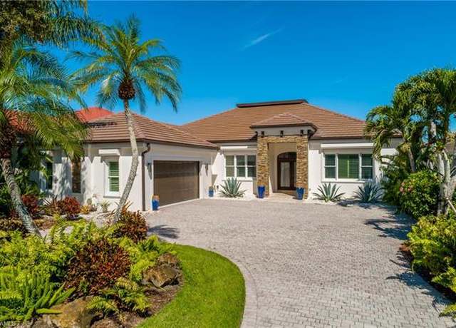 Property at 15254 Burnaby Dr, Naples, FL 34110, 4 beds, 3.5 baths