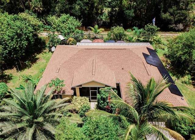 Property at 1304 W 18th St, Lehigh Acres, FL 33972, 4 beds, 2 baths
