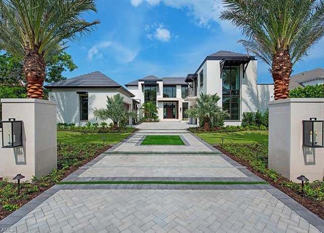 Property at 3300 Gin Ln, Naples, FL 34102, 5 beds, 7.5 baths