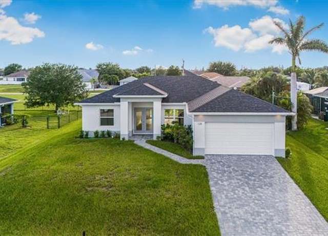 Property at 128 NW 26th Pl, Cape Coral, FL 33993, 3 beds, 3 baths