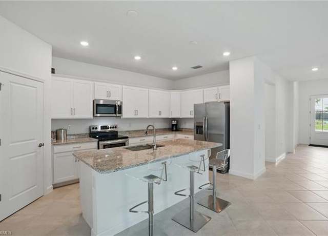 Property at 13952 Hunter Oak Dr, Fort Myers, FL 33913, 4 beds, 3 baths