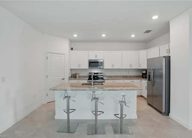 Property at 13952 Hunter Oak Dr, Fort Myers, FL 33913, 4 beds, 3 baths