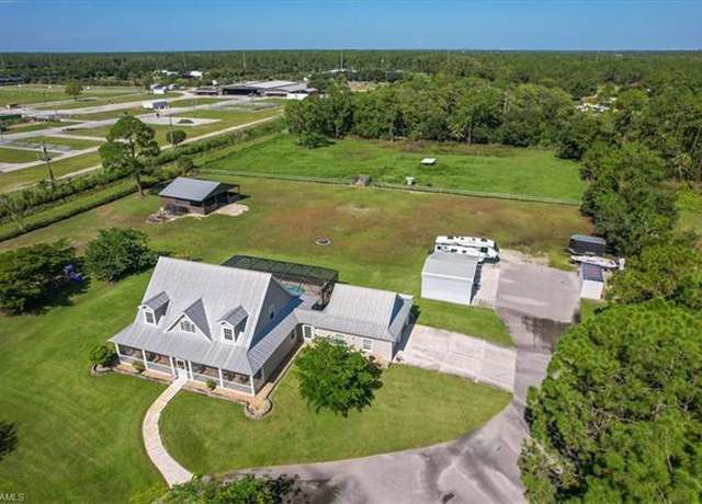 Property at 4235 10th St NE, Naples, FL 34120, 4 beds, 3.5 baths
