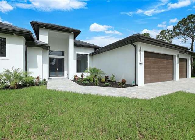 Property at 1068 16th St NE, Naples, FL 34120, 4 beds, 3 baths
