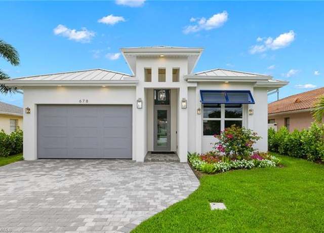 Property at 664 100th Ave N, Naples, FL 34108, 4 beds, 3 baths