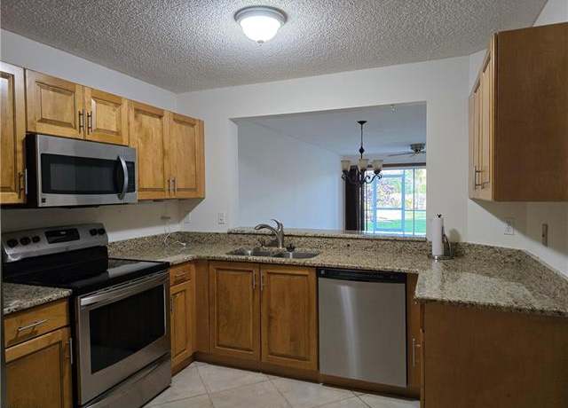 Property at 5737 Whitaker Rd Unit C104, Naples, FL 34112, 3 beds, 2 baths