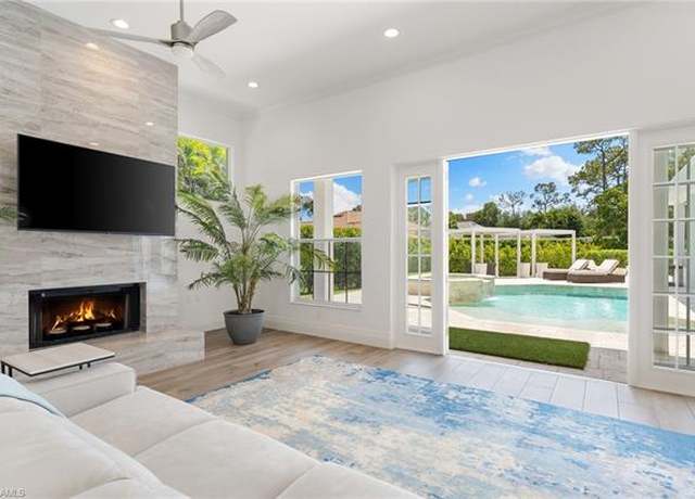 Property at 2274 Hawksridge Dr, Naples, FL 34105, 4 beds, 3.5 baths