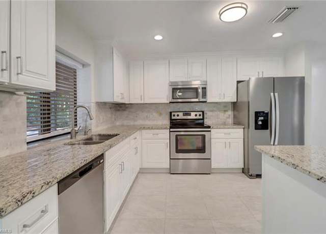 Property at 710 25th St NW, Naples, FL 34120, 3 beds, 2 baths
