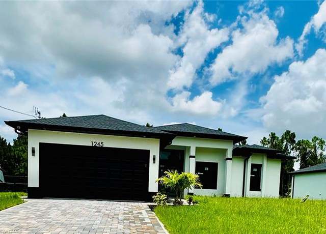 Property at 1245 Earnest St E, Lehigh Acres, FL 33974, 4 beds, 2 baths