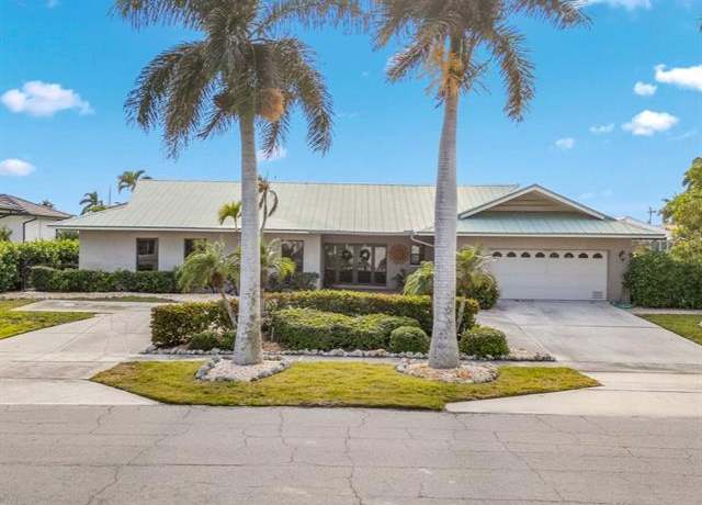 Property at 334 Grapewood Ct, Marco Island, FL 34145, 4 beds, 3 baths