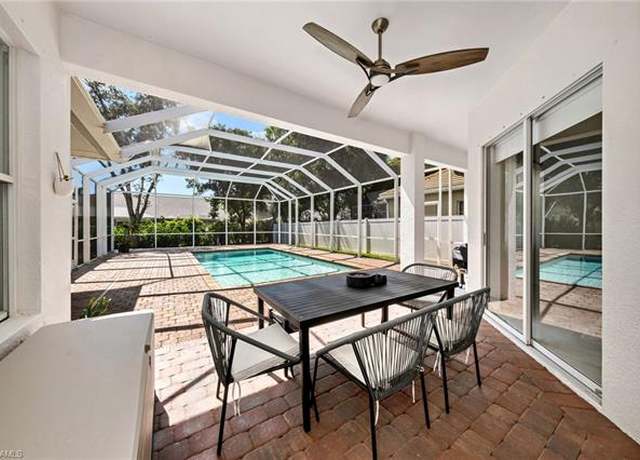 Property at 8532 Laurel Lakes Blvd, Naples, FL 34119, 4 beds, 3 baths