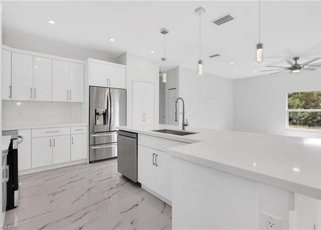 Property at 3003 NE Juanita Pl, Cape Coral, FL 33909, 3 beds, 2.5 baths