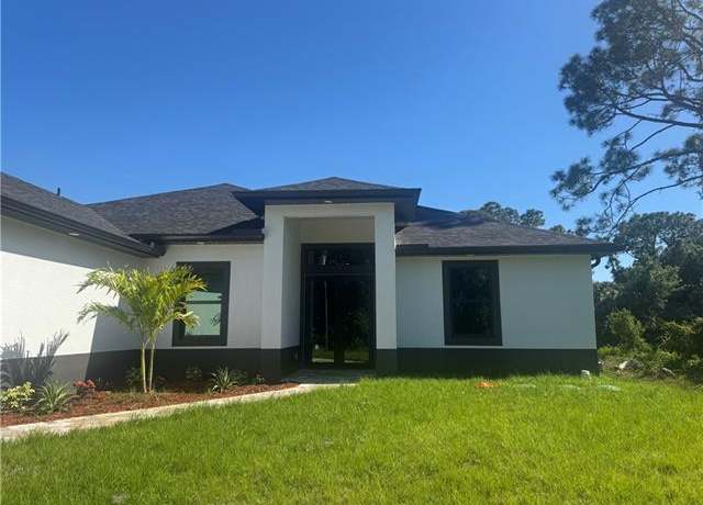 Property at 838 Calumet St E, Lehigh Acres, FL 33974, 3 beds, 2 baths