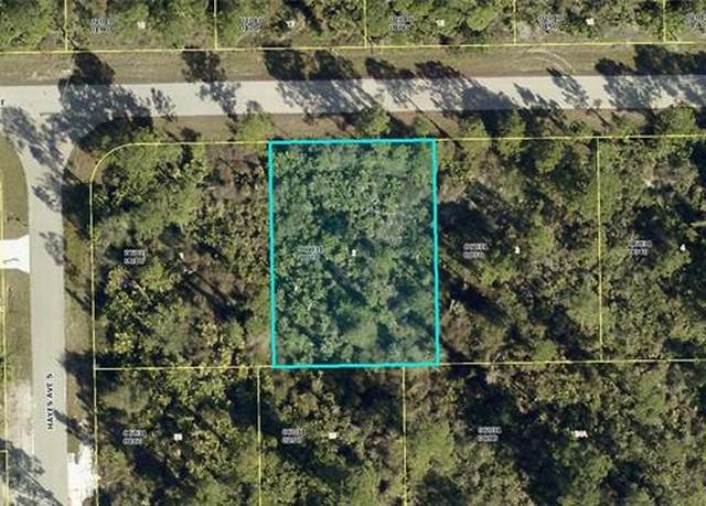 Property at 1150 Deauville St E, Lehigh Acres, FL 33974