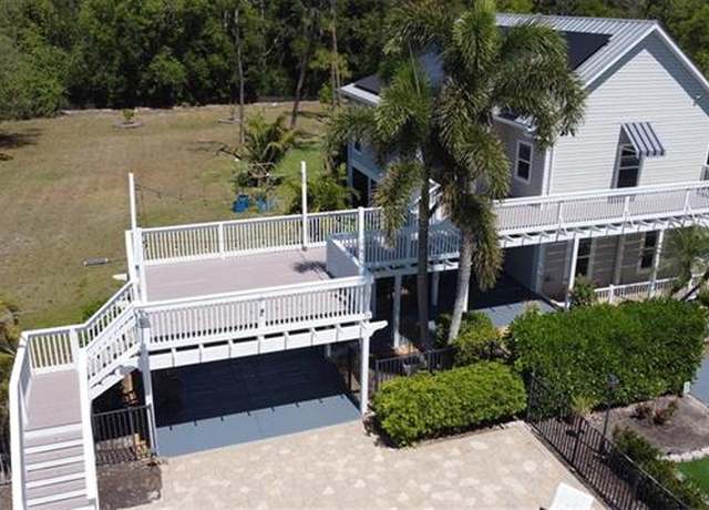Property at 6941 Hunters Rd, Naples, FL 34109, 4 beds, 2 baths