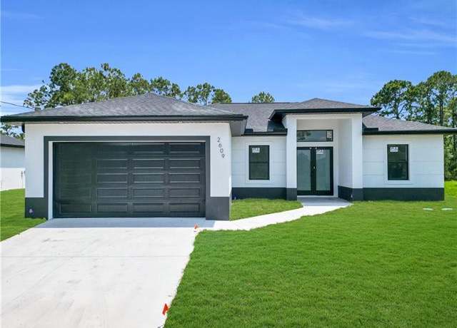 Property at 2609 45th St W, Lehigh Acres, FL 33971, 3 beds, 2 baths