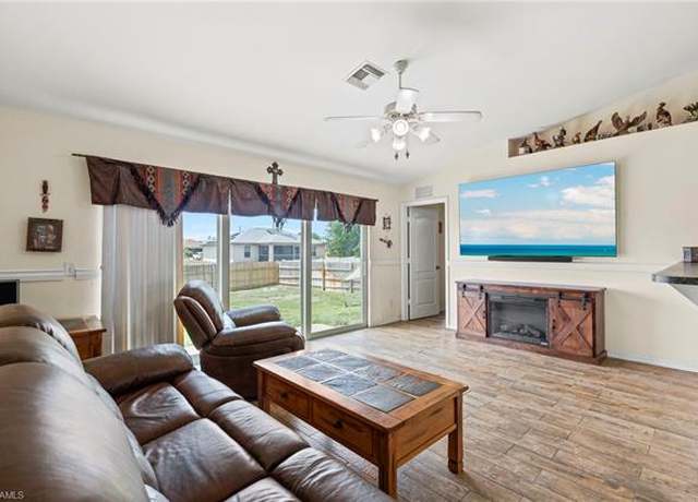 Property at 3303 32nd St SW, Lehigh Acres, FL 33976, 3 beds, 2 baths