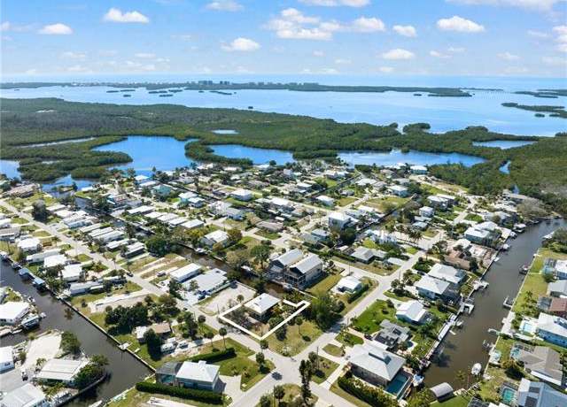 Property at 24509 Dolphin St, Bonita Springs, FL 34134, 3 beds, 2 baths
