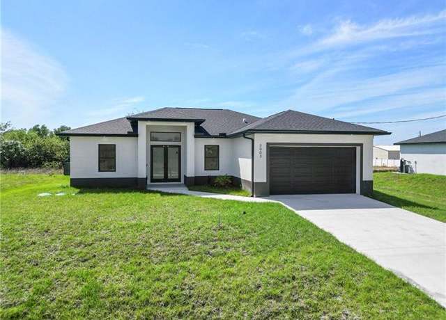 Property at 2003 Curry Ave N, Lehigh Acres, FL 33971, 3 beds, 2 baths