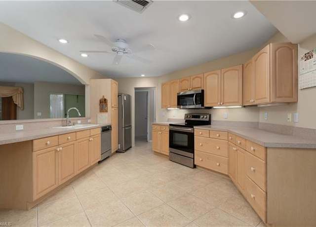 Property at 112 Fairway Cir, Naples, FL 34110, 3 beds, 2 baths