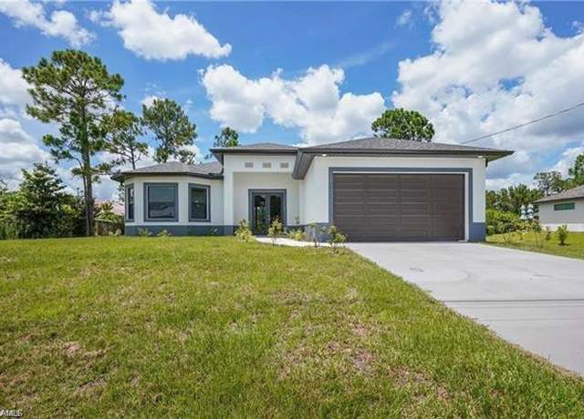 Property at 804 W 9th St, Lehigh Acres, FL 33972, 4 beds, 2 baths