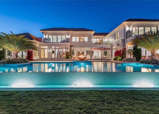 Property at 860 Admiralty Parade E, Naples, FL 34102, 5 beds, 6 baths